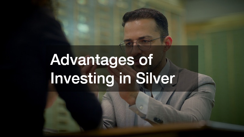 man holding a silver bar